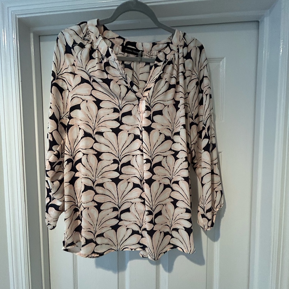 Lightweight 3/4 sleeve blouse.